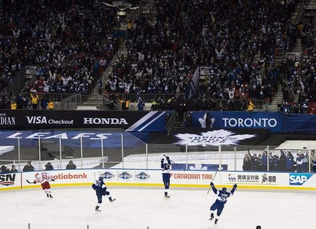 Toronto Maple Leafs centre Auston Matthews (34) celebrates his game winning overtime goal following NHL Centennial Classic hockey action against the Detroit Red Wings, in Toronto on Sunday, January 1, 2017. 