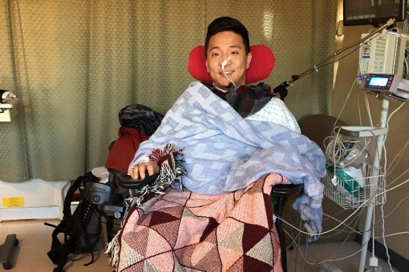 Andrew Cho at Vancouver General Hospital, where he is recovering from a sudden paralysis.