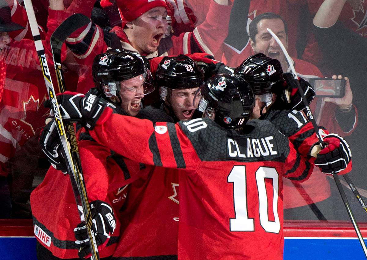 Canada's Anthony Cirelli celebrates his goal against Sweden with teammates during first period IIHF World Junior Championship semifinals hockey action Wednesday, January 4, 2017 in Montreal. 