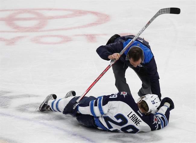 Winnipeg Jets forward Patrik Laine was hit and got a concussion in 2017. Concussions and other traumatic brain injuries are associated with a higher risk of suicide, according to a new study.