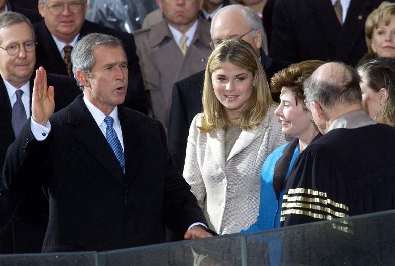 George W. Bush takes the oath of office from Chief Justice William Rehnquist to become the 43rd president Saturday, Jan. 20, 2001, in Washington. (AP Photo/Doug Mills)