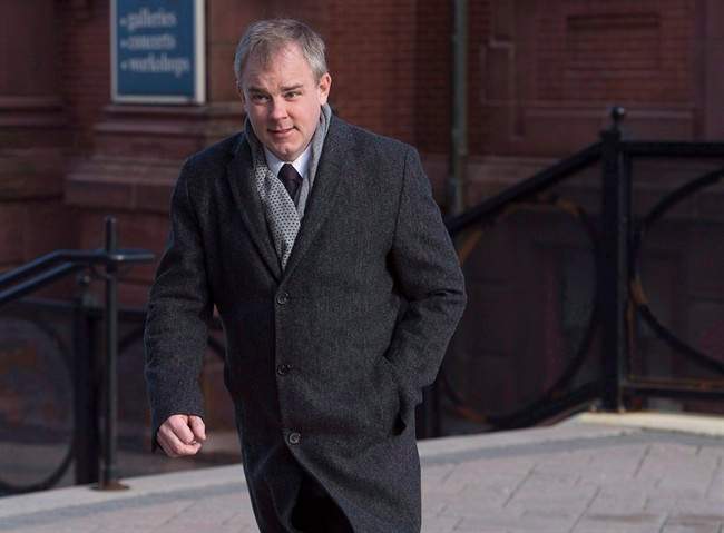 Dennis Oland arrives at Court of Queen's Bench in Saint John, N.B. on Tuesday, Jan. 3, 2017. Two men have been charged with assaulting Oland while he was imprisoned in a federal penitentiary in New Brunswick.