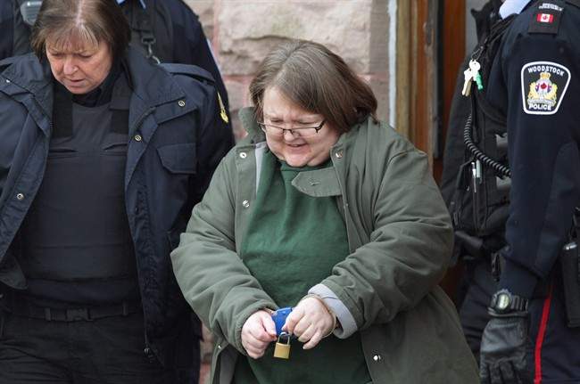 Elizabeth Wettlaufer is escorted from the courthouse in Woodstock, Ont., on Friday, Jan. 13, 2017.