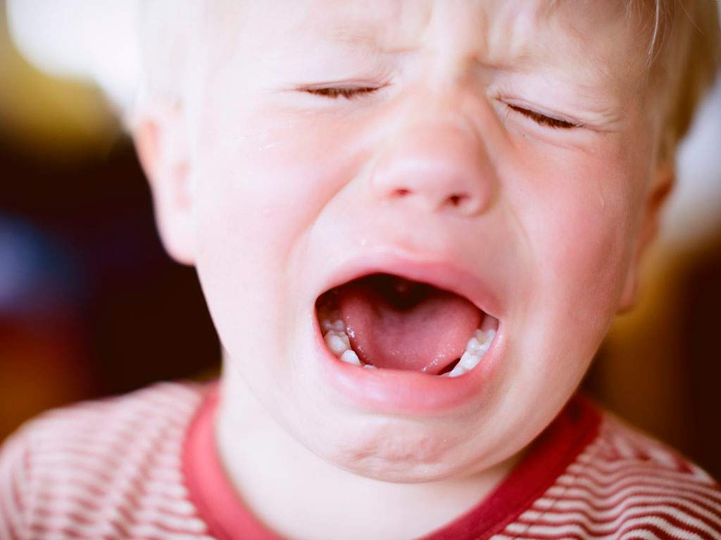 A woman was recently asked to move her crying baby from first class to the back of the plane. But was the airline justified in their request? .
