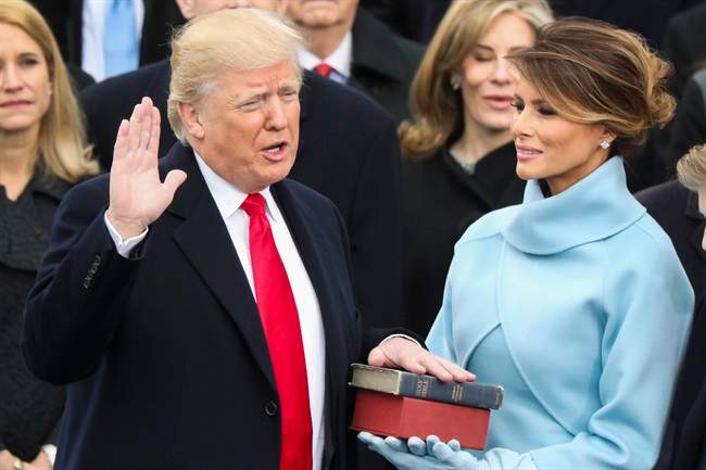 Manitoba businesses who trade heavily with the United States are watching with cautious optimism as the 45th President of the U.S is sworn in Friday.