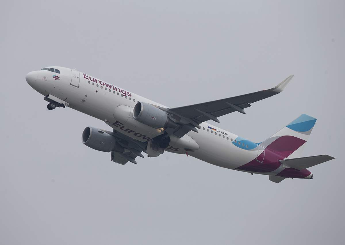 An Eurowings passenger aircraft, the low-cost carrier operated by Deutsche Lufthansa AG, takes off from Duesseldorf airport, operated by Flughafen Duesseldorf GmbH, in Duesseldorf, Germany, on Tuesday, March 1, 2016.