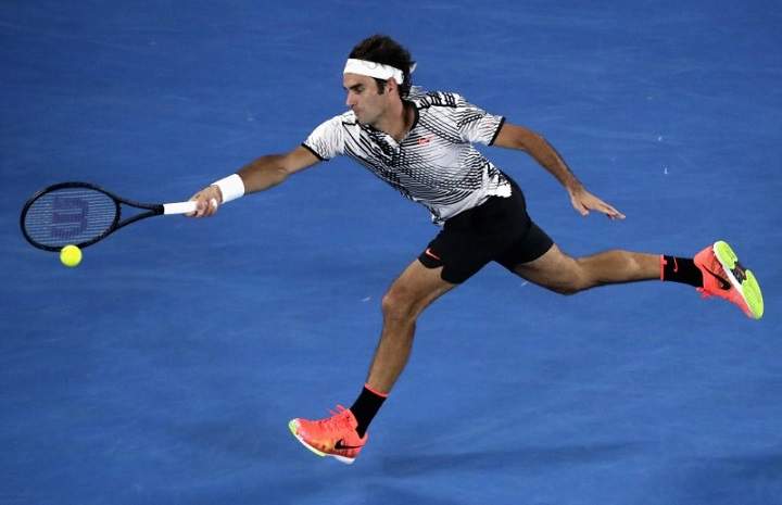 Tennis – Australian Open – Melbourne Park, Melbourne, Australia – 26/1/17 Switzerland’s Roger Federer hits a shot during his Men’s singles semi-final match against Switzerland’s Stan Wawrinka. REUTERS/Jason Reed