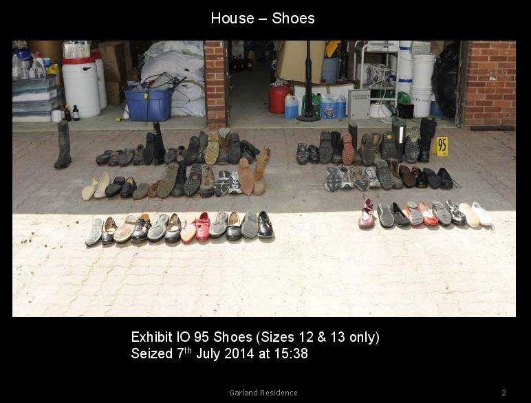 Shoes seized from the Garland property presented in Douglas Garland’s murder trial on Jan. 25, 2017.