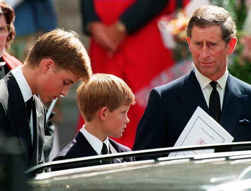 Prince Charles and his two sons Harry (centre) and William are seen in front of Westminster Abbey in London after Princess Diana’s funeral in September, 1997. At the time of their mother’s death, Harry was 12 and William was 15.