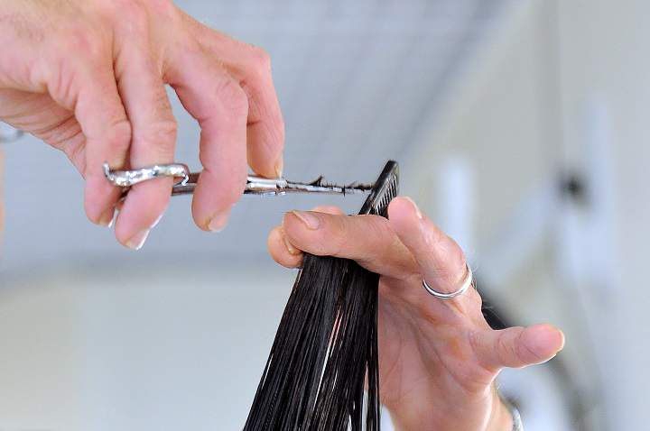 Illinois stylists and esteiticians are required by law to take training to help identify clients who are grappling with domestic or sexual abuse.