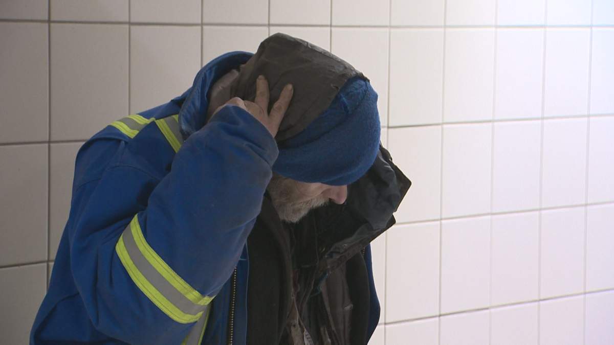 File shot of an Edmontonian seeking shelter in Churchill LRT Station, Jan. 12, 2017.