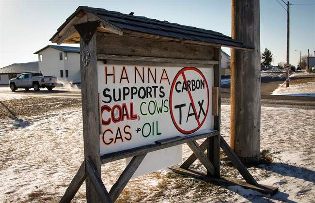 Residents of Hanna, Alta. have erected a sign showing their feelings about government policies as seen on Tuesday, Dec. 13, 2016.