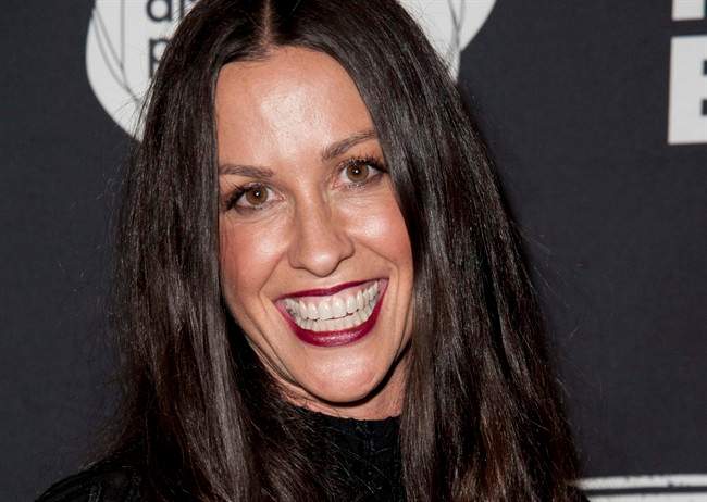 This June 20, 2014 file photo Alanis Morissette arrives at the 4th Annual Production Of The 24 Hour Plays After-Party in Santa Monica, Calif. 