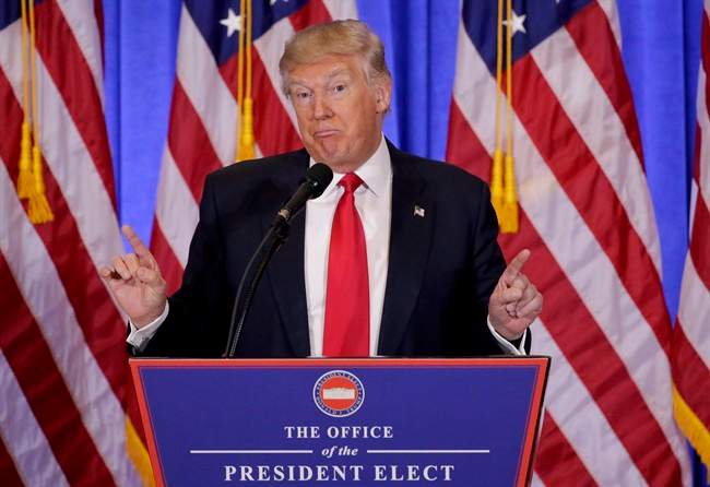 In this file photo dated Wednesday, Jan. 11, 2017, President-elect Donald Trump speaks during his first news conference as President-elect, in New York. 