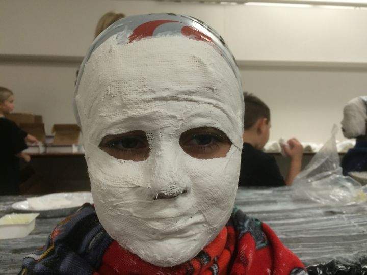 Students at Calgary’s Sunalta Elementary School make masks for the “Face Off” project.