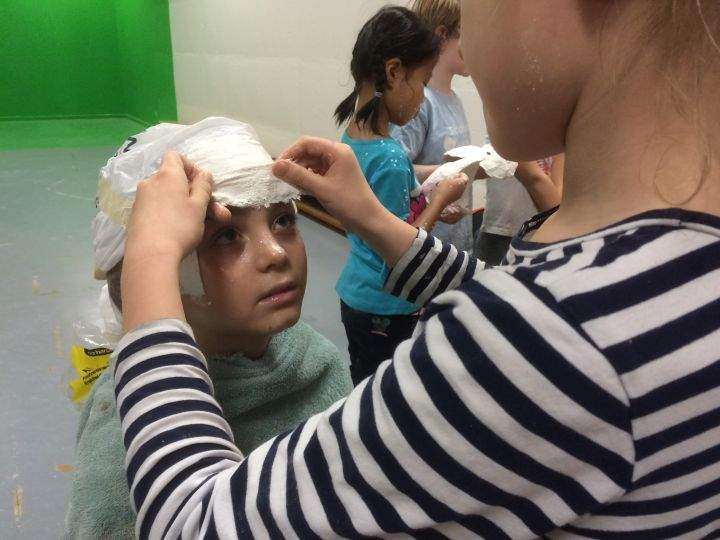 Students at Calgary’s Sunalta Elementary School make masks for the “Face Off” project.