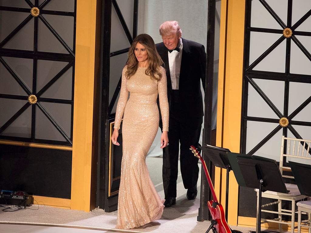 In a pale gold Reem Acra gown for the candlelight dinner in Union Station.