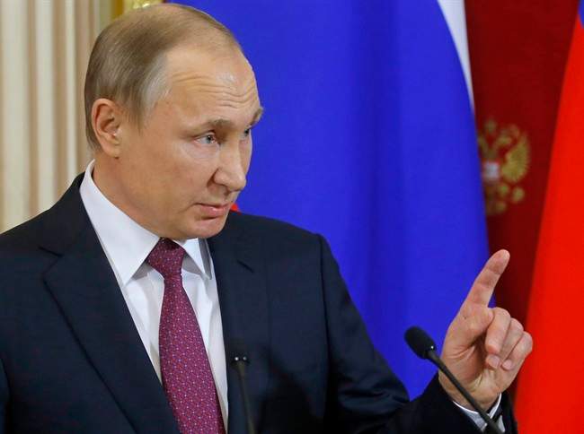 Russian President Vladimir Putin speaks at a joint news conference.(Sergei Ilnitsky/Pool Photo via AP).