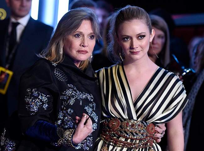 In this Dec. 14, 2015, file photo, Carrie Fisher, left, and daughter Billie Lourd arrive at the world premiere of “Star Wars: The Force Awakens” at the TCL Chinese Theatre in Los Angeles. Lourd says the support she’s received since the death of her mother and her grandmother, Debbie Reynolds, has given her strength.