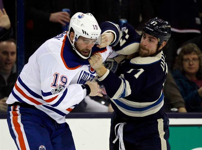 Columbus Blue Jackets forward Brandon Dubinsky, right, fights with Edmonton Oilers forward Patrick Maroon during the second period of an NHL hockey game in Columbus, Ohio, Tuesday, Jan. 3, 2017. 