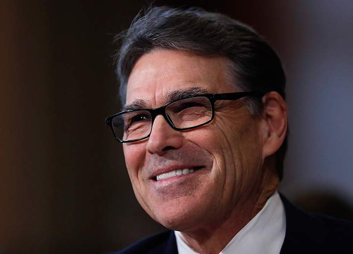 Energy Secretary-designate, former Texas Gov. Rick Perry, smiles as he testifies on Capitol Hill in Washington, Thursday, Jan. 19, 2017, at his confirmation hearing before the Senate Energy and Natural Resources Committee.