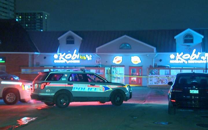 Police investigate a shooting at a strip mall on Steeles Avenue East in Thornhill, Ont., on Jan. 31, 2017.