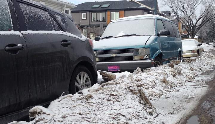 Vehicles stuck behind windrows in Calgary.