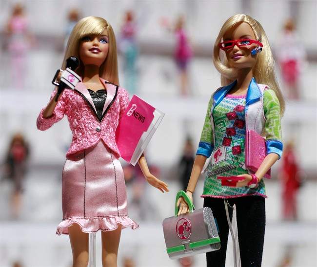 FILE - In this Feb. 14, 2010 file photo, news anchor Barbie, left, and computer engineer Barbie are arranged for a photo at the New York Toy Fair.