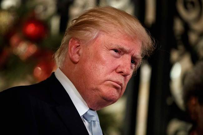President-elect Donald Trump listens to a question as he speaks to reporters at Mar-a-Lago, in Palm Beach, Fla. in this Dec. 28, 2016 file photo.