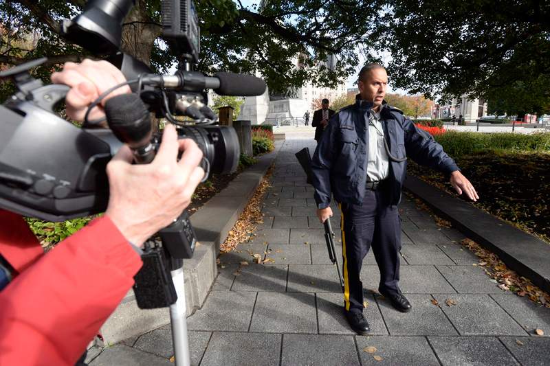 Police secure an area around Parliament Hill in Ottawa on Wednesday Oct.22, 2014. 