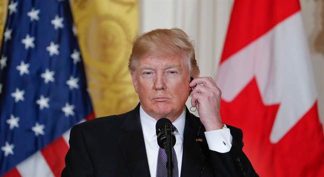 President Donald Trump listens during a joint news conference with Canadian Prime Minister Justin Trudeau in the East Room of the White House in Washington, Monday, Feb. 13, 2017.