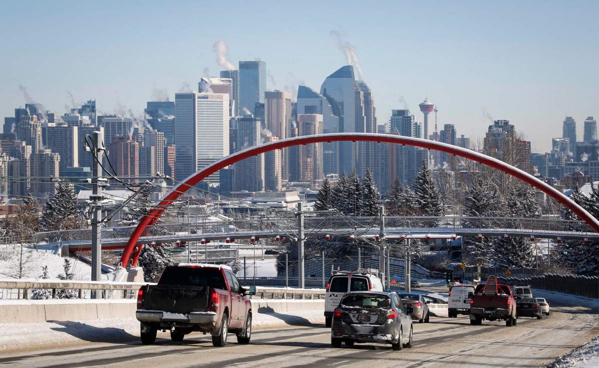 Highway traffic moves into Calgary, Alta., Wednesday, Feb. 8, 2017. New census data shows the population of the metropolitan area of Calgary outpaced the national growth rate over the last five years. THE CANADIAN PRESS/Jeff McIntosh.