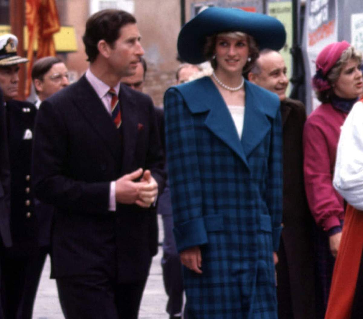 FILE – In this May 5, 1985 file photo, Diana, Princess of Wales wears a blue tartan Emanuel suit during an official visit to Venice, Italy, with Britain’s Prince Charles. (/PA via AP)