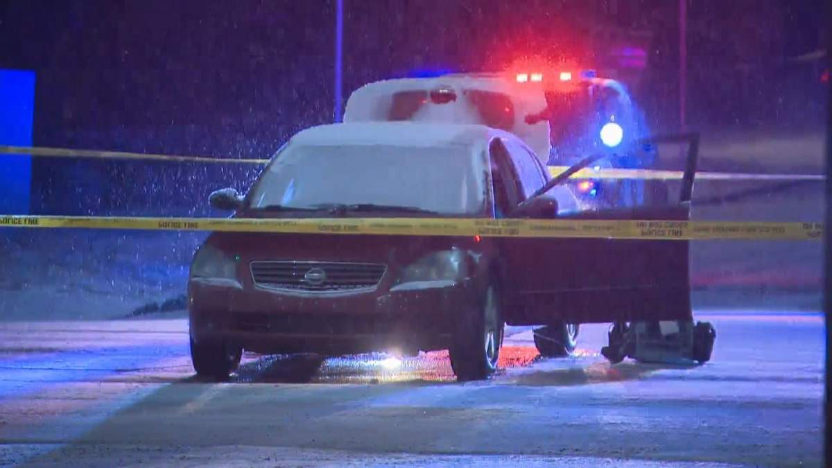 Calgary police investigate a suspcious death in the intersection of Centre Street and 12 Avenue on Thursday, Feb. 23, 2017. 