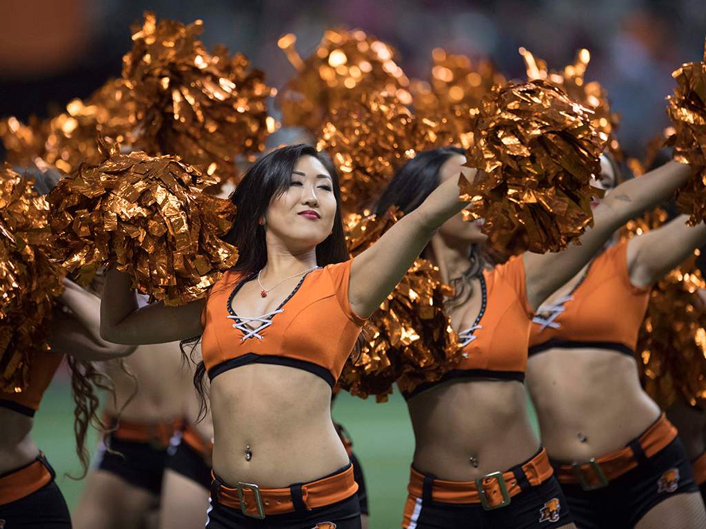 There's more to cheerleading than pom-poms and skimpy outfits. The women who make up these teams have their eye on the prize, and it has little to do with football.