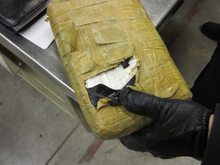Border officials say the packages tested positive for suspected cocaine.