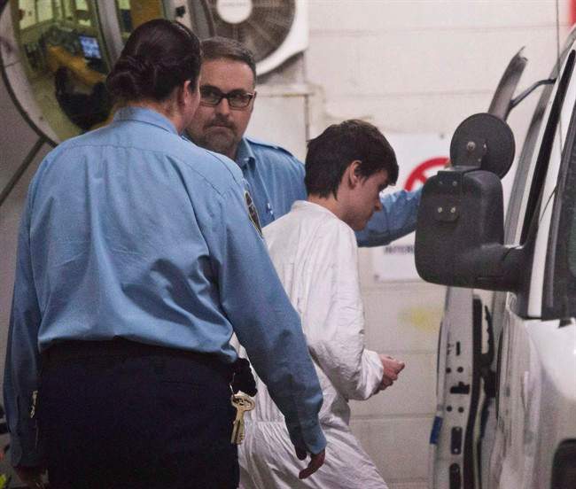 Alexandre Bissonnette is escorted to a van after appearing in court for the deadly shooting at a mosque on January 30, 2017 in Quebec City. Bissonnette will bypass his preliminary hearing and go straight to trial. Monday, Oct. 2, 2017.