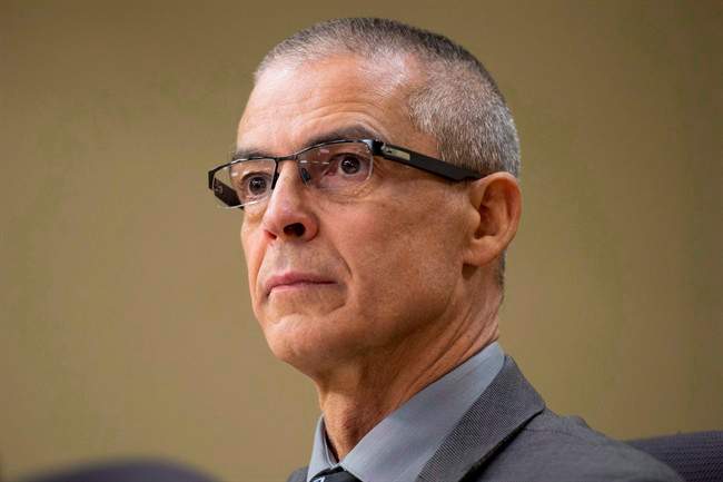 CSIS director Michel Coulombe waits to appear at the Senate national security committee meeting to discuss Bill C-51, the anti-terrorism Act, in Ottawa on April 20, 2015. THE CANADIAN PRESS/Adrian Wyld.