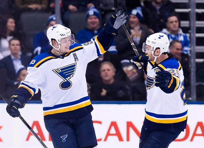 St. Louis Blues right wing Vladimir Tarasenko (91) celebrates his game-winning goal with defenceman Kevin Shattenkirk (22) after scoring against the Toronto Maple Leafs during the overtime period of an NHL game in Toronto on Thursday, February 9, 2017.