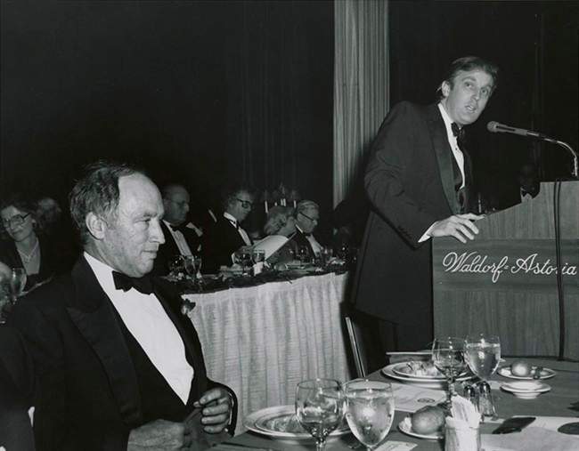 Pierre Trudeau listens to Donald J. Trump on November 5, 1981 in this Library and Archives of Canada photo in New York. Canada\’s diplomatic gifts to President Trump included a picture of himself, standing next to Pierre Trudeau, when they spoke at the same event in 1981. Trump said of the gift: \”(Justin\’s) father I knew, and respected greatly.\”