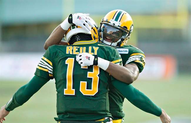 Two football players share a special moment.