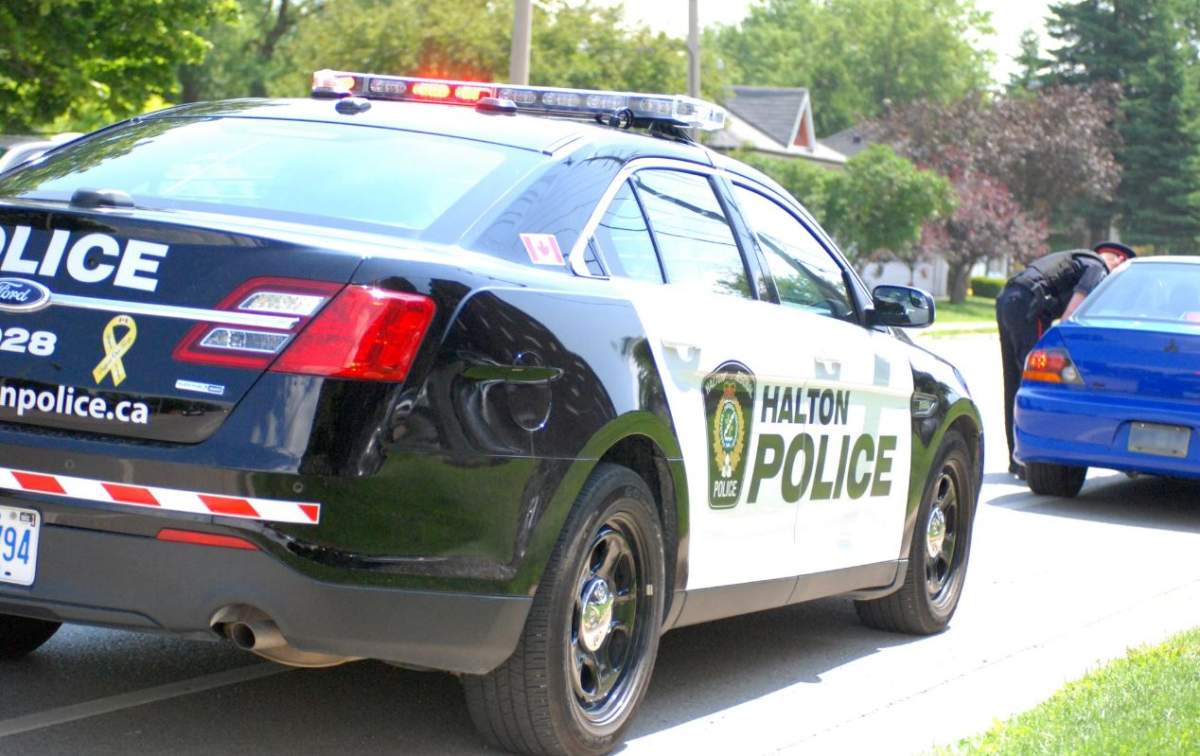Halton Regional Police have charged an Oakville man who allegedly pretended to be a Toronto police officer.