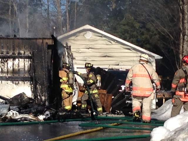 Firefighters work to put out a fire at a New Maryland, N.B. home on Tuesday, Feb. 28, 2017. 