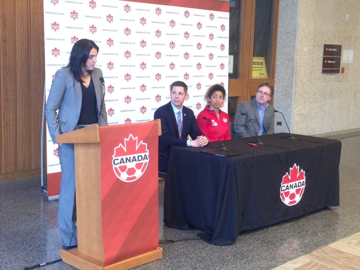 Desiree Scott and Mayor Brian Bowman at City Hall Tuesday morning. The Canadian women's soccer team will be playing in Winnipeg this June and taking on Costa Rica on the field.