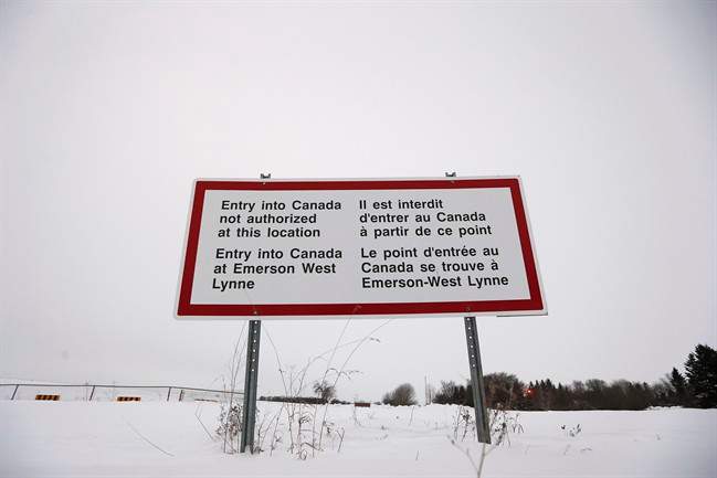 A sign is seen near Emerson, Man. Thursday, February 9, 2016. Refugees have been illegally crossing the Manitoba/U.S. border and ending up in Emerson, Manitoba.