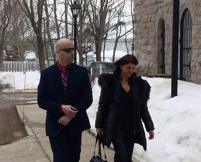 Const. Patrick Bulger, left, walks into the courthouse in Bathurst, NB. on Friday, February 24, 2017. 
