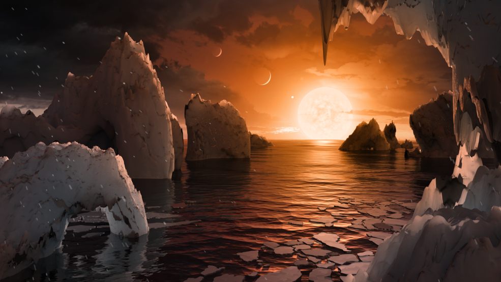 This illustration shows the possible surface of TRAPPIST-1f, one of the newly discovered planets.