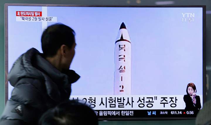 A man watches a TV news program showing a photo published in North Korea’s Rodong Sinmun newspaper of North Korea’s “Pukguksong-2” missile launch, at Seoul Railway station in Seoul, South Korea, Monday, Feb. 13, 2017.