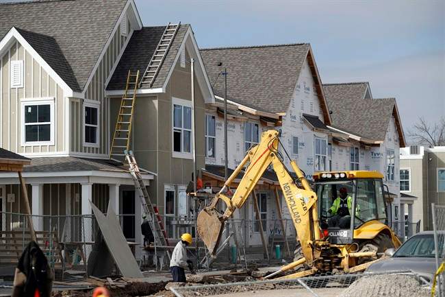 CMHC says 206 new homes were built in Hamilton last month, down from 319 in June of last year.