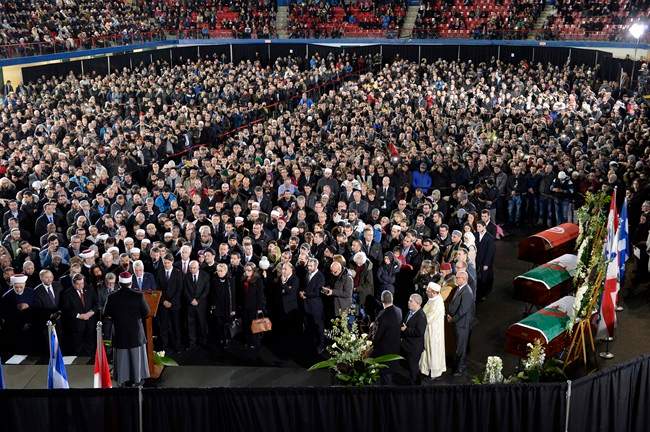 An overall view of the funeral for Abdelkrim Hassane, Khaled Belkacemi and Aboubaker Thabti, three of the six victims of the Quebec City mosque shooting, at the Maurice Richard Arena in Montreal, Thursday, February 2, 2017.